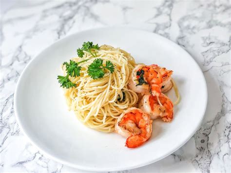 easy-shrimp-with-angel-hair-pasta-recipe-the-spruce image