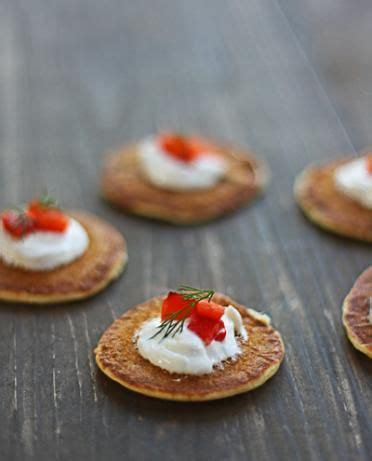 green-onion-blinis-with-red-pepper-relish-and-goat image