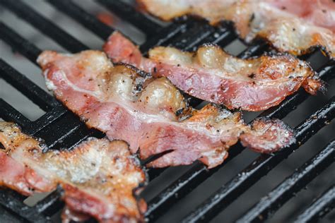 homemade-smoked-peppered-bacon image