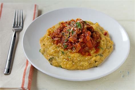 mediterranean-kale-polenta-with-spicy-italian-sausage image
