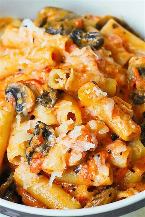 penne-pasta-in-creamy-vodka-tomato-sauce-with-mushrooms image