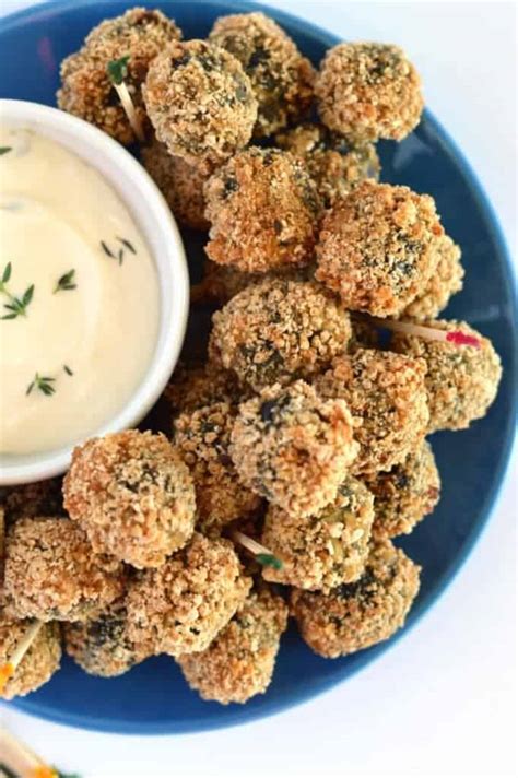sausage-stuffed-fried-olives-with-garlic-thyme-aioli image