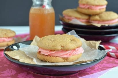apple-cider-whoopie-pies-with-red-hot-frosting image