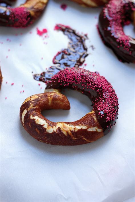 heart-shaped-chocolate-dipped-soft-pretzels-baker image