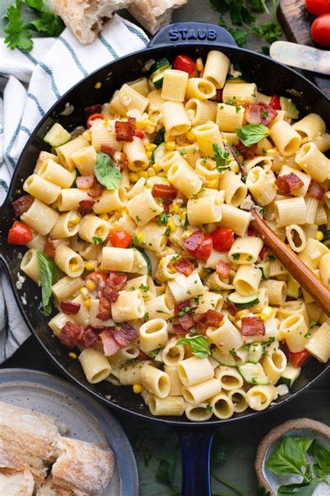 pasta-with-corn-bacon-tomatoes-and-zucchini image