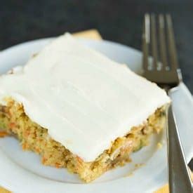 carrot-zucchini-bars-with-cream-cheese-icing-brown image