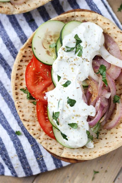 easy-10-minute-veggie-greek-pita-sandwiches-fork-in image