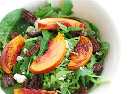 arugula-spinach-salad-with-peaches-and-pecans image