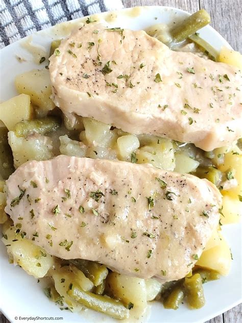 slow-cooker-pork-chops-with-potatoes-and-green-beans image