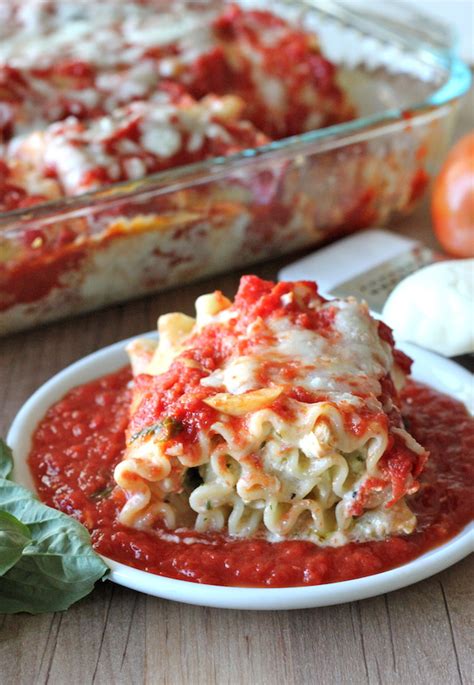 chicken-pesto-lasagna-roll-ups-damn-delicious image