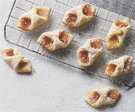 bow-tie-cookies-with-apricot-preserves image