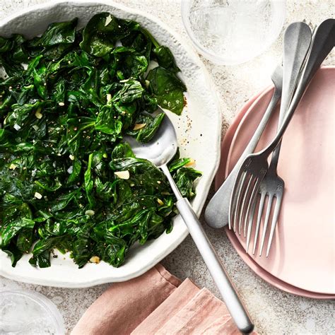 wilted-spinach-with-garlic-eatingwell image