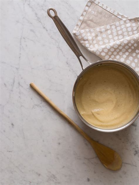 roasted-cauliflower-and-parsnip-soup-recipe-spoon image