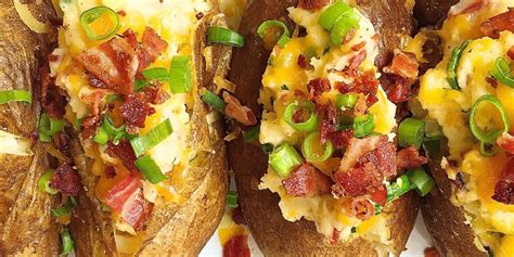 loaded-baked-potatoes-with-bacon-and-cheddar-delish image