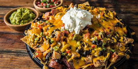 ultimate-loaded-nachos-recipe-traeger-grills image
