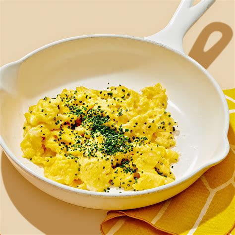 creamy-scrambled-eggs-with-chives-recipe-eatingwell image