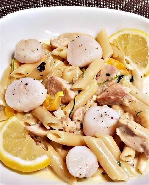 creamy-parmesan-chicken-and-scallop-pasta image