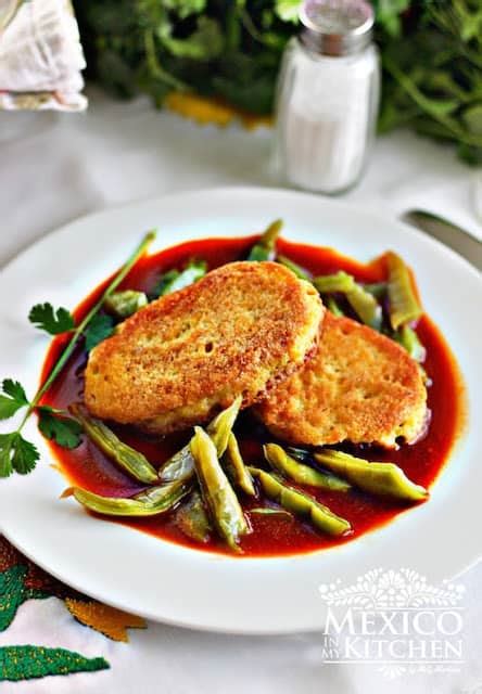 dried-shrimp-patties-in-a-red-sauce-with-cactus image