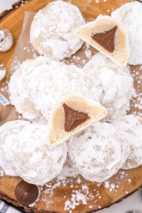 soft-and-chewy-secret-kiss-cookies-with-powdered-sugar image