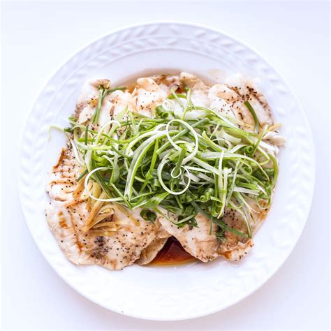 steamed-fish-with-scallions-ginger-and-soy-sauce-ca image