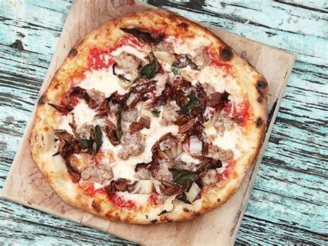 11-grilled-pizza-recipes-to-make-in-your-backyard image