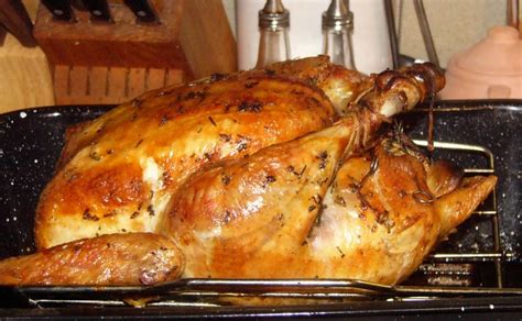 golden-perfection-oven-roasted-capon-rosemaries image