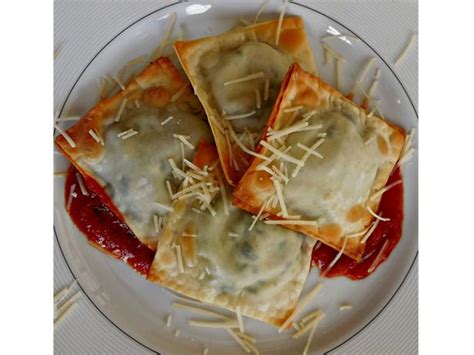 baked-spinach-and-cheese-ravioli-food-network image