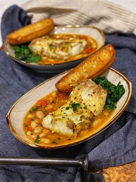 pan-seared-halibut-in-a-spicy-tomato-broth image