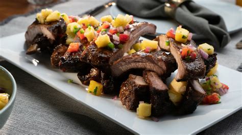 jerk-baby-back-ribs-with-pineapple-salsa image