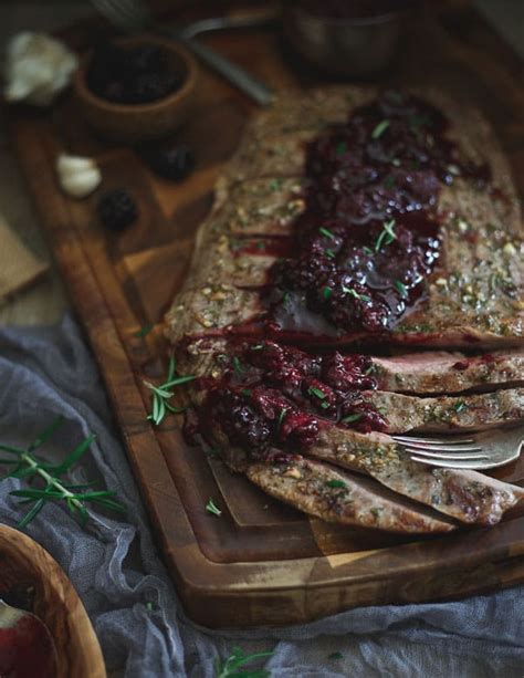 rosemary-garlic-flank-steak-with-tangy-blackberry-sauce image