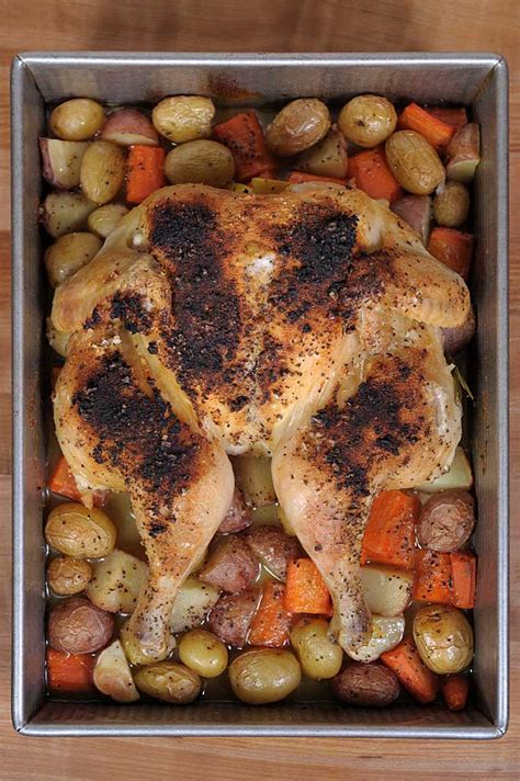spatchcocked-roasted-lemon-chicken-with-potatoes-and-carrots image