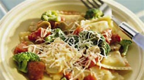 ravioli-with-broccoli-tomatoes-and-mushrooms image