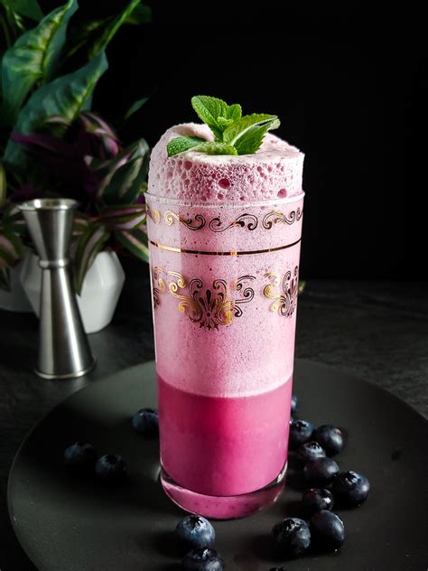 blueberry-ramos-gin-fizz-mocktail-cocktail-contessa image