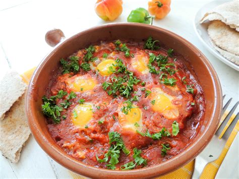 poached-quail-eggs-in-tomatoes-sauce-the-petit image