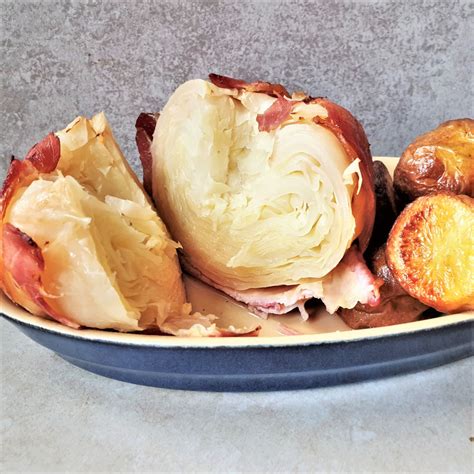 baked-cabbage-wrapped-in-bacon-foodle-club image
