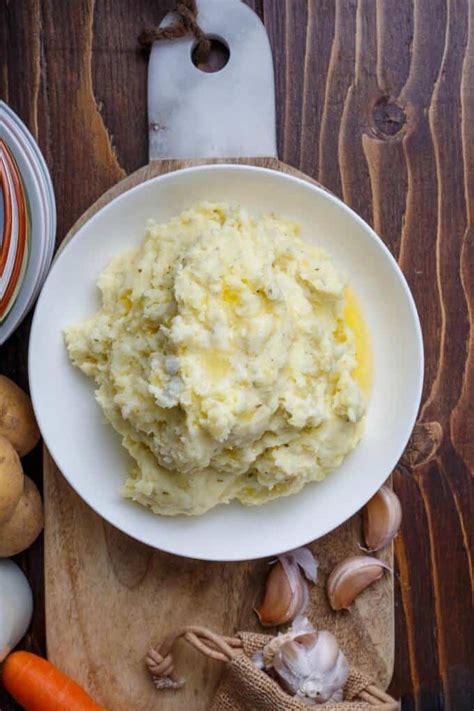 herb-and-garlic-cream-cheese-mashed-potatoes-the image