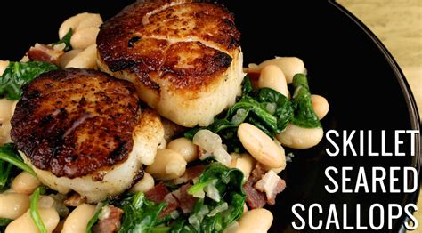 skillet-seared-scallops-with-white-beans-spinach image