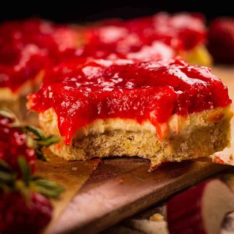 strawberry-rhubarb-cheesecake-bars-recipe-saporito image