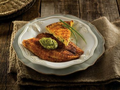 spicy-fish-with-avocado-chipotle-sauce-and-skillet image