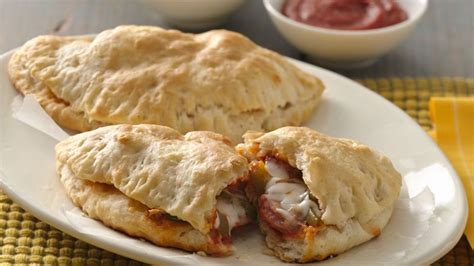 chicken-sausage-calzones-for-two-recipe-pillsburycom image