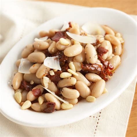white-beans-with-dried-tomatoes-recipe-eatingwell image