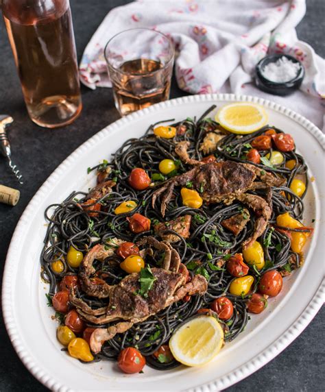 squid-ink-pasta-with-soft-shell-crab-and-tomatoes image