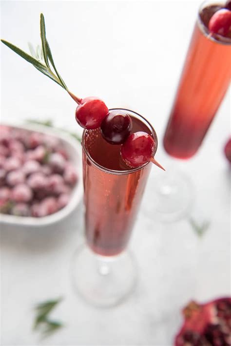 cranberry-pomegranate-champagne-cocktail-sugar-and image