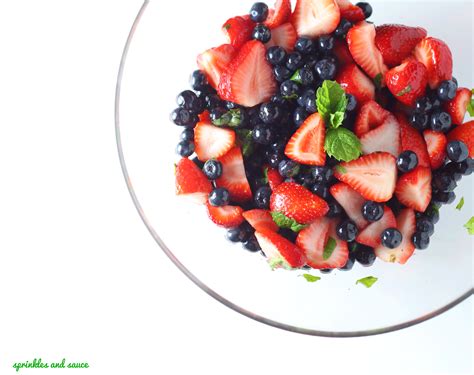 strawberry-and-blueberry-fruit-salad-with-honey-mint-and-brandy image