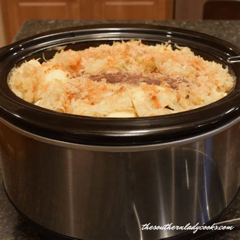slow-cooker-pork-roast-and-sauerkraut-the-southern image