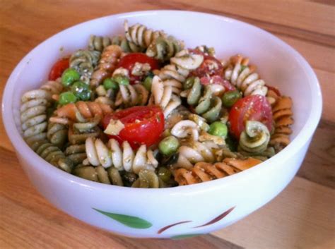 classic-pesto-pasta-salad-recipe-with-olives-pine-nuts image