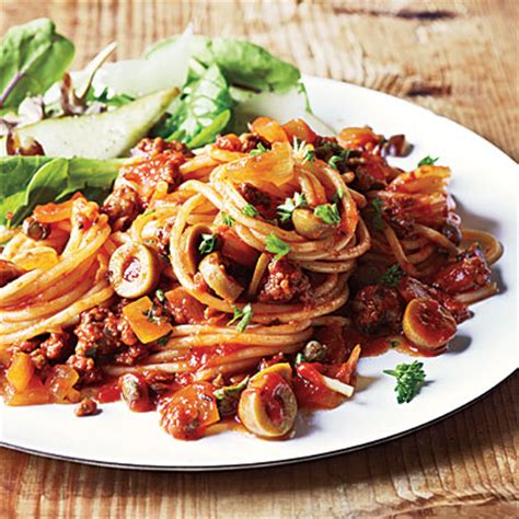spanish-spaghetti-with-olives-recipe-myrecipes image