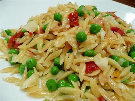 orzo-with-sundried-tomatoes-peas-parmesan image