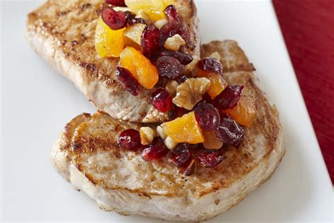 cranberry-apple-pork-chops-recipe-the-spruce-eats image