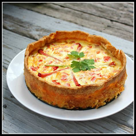 country-ham-cheddar-and-tomato-quiche-cut-out image